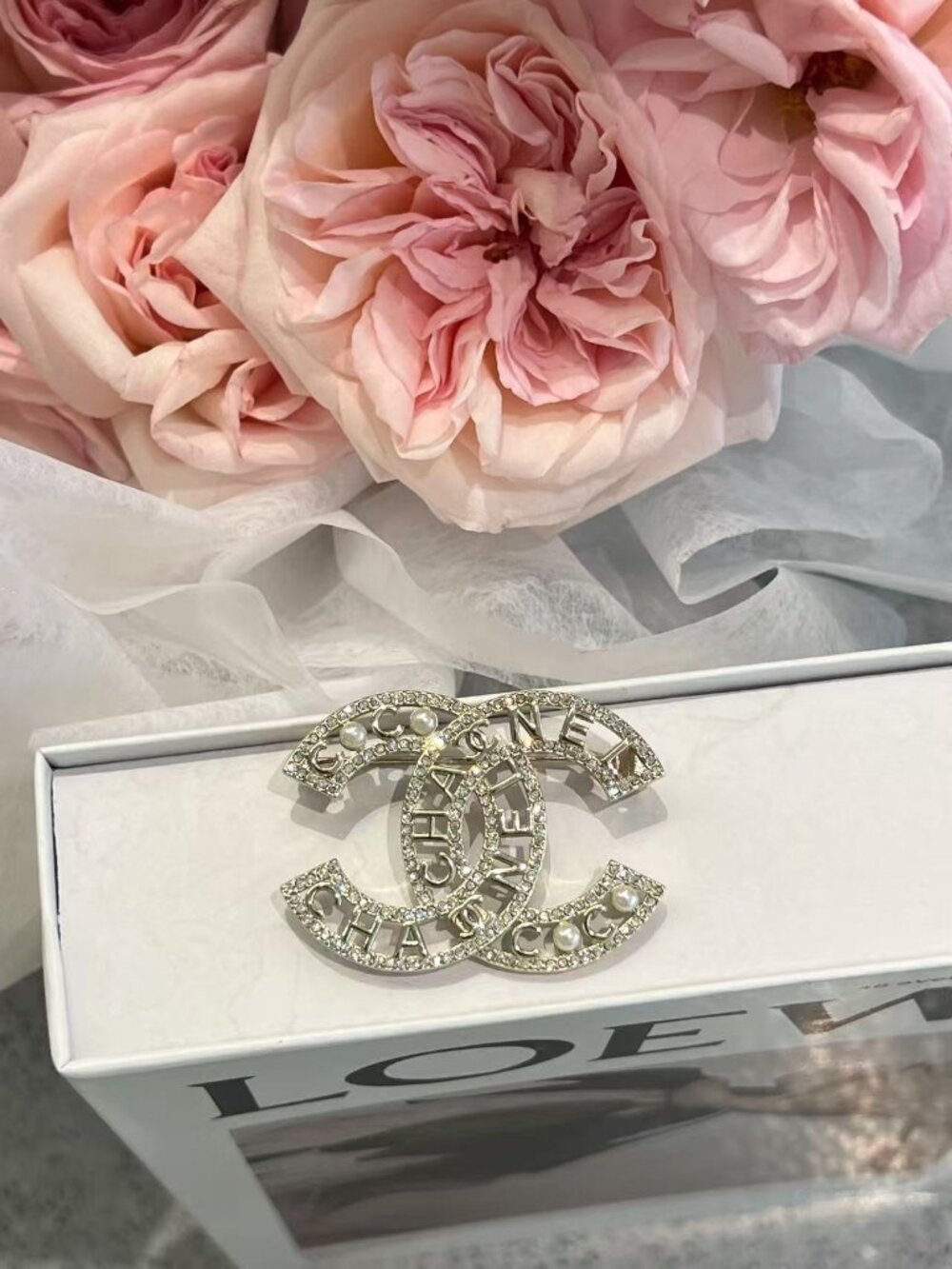 Chanel Gold CC Brooch with Pearl Accent Timeless Luxury Piece